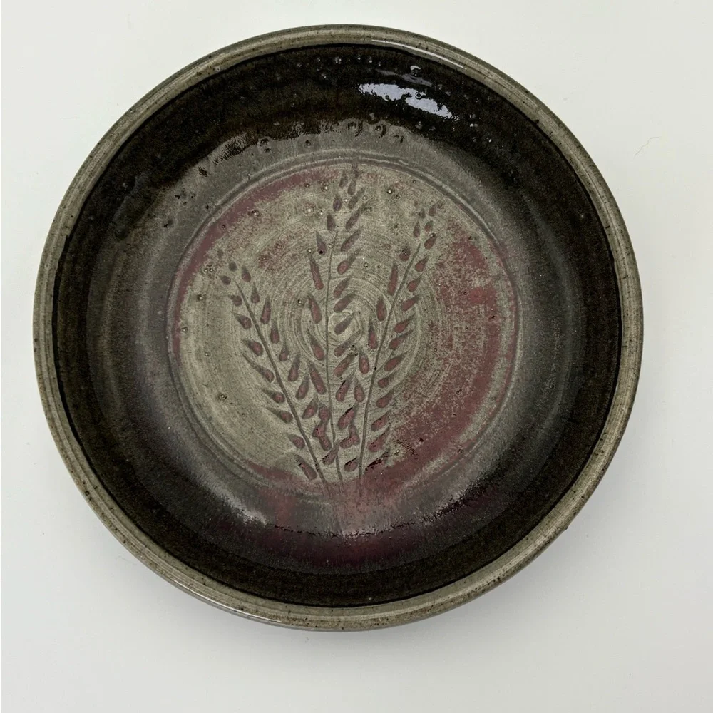 Signed Handcrafted Pottery  Plate with Dark Red Wheat Design on Gray-Green